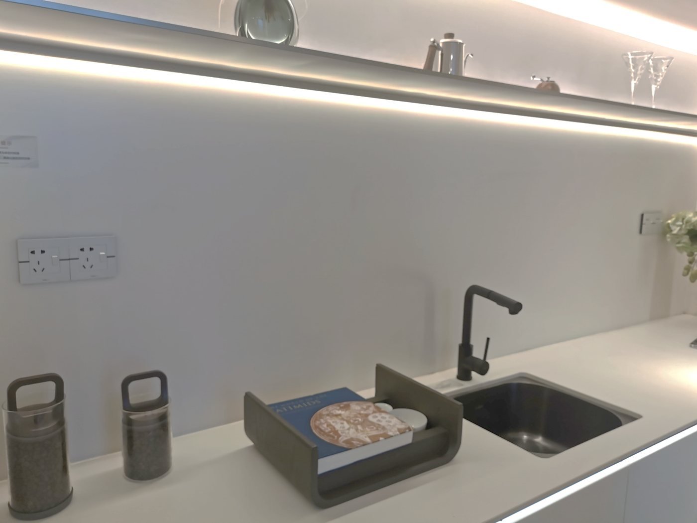 Ultra-thin sintered stone kitchen countertop with integrated sink